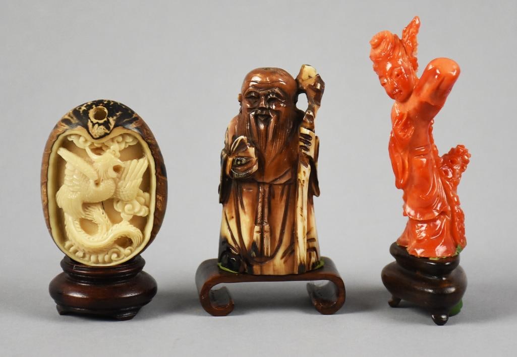 Antique Chinese Natural Materials Carved Figurines: Beautiful small collection of Chinese figurines. These antique pieces consist of a coral female immortal, a Shou Lao in bone and an eagle in a seed pod or shell. They all stand from approx. 2.5" x 3.2