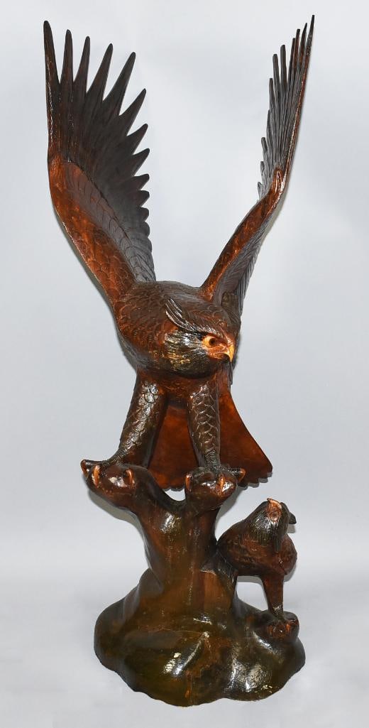 Huge Hand Carved Wooden Eagle, 41" Tall: This is a wonderful sculpture in the form of an eagle. It appears to be hand carved perched on a branch and has a baby eagle at it's feet. No visible marks and stands approx. 41" tall. From The home