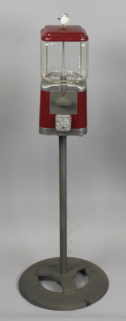c1960 Vintage Acorn Bubblegum Machine, Sparrow Key: This fun bubblegum machine is from Oak Manufacturing and is an Acorn machine. Case appears aluminum with rounded corner glass globe. Delivery flap with "Thank you" and an Acorn appears chrome. Key is