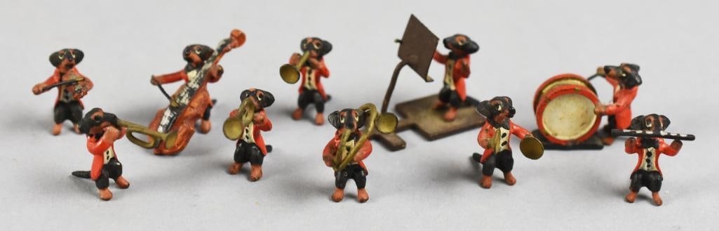 Austrian Miniature Dachshund Orchestra, Cold Painted Bronze: This darling set is Austrian cold painted bronze. They are an orchestra of dachshund dogs. There are horn players, a drummer, violinist, cellist, one playing the flute, one on cymbals and of course,