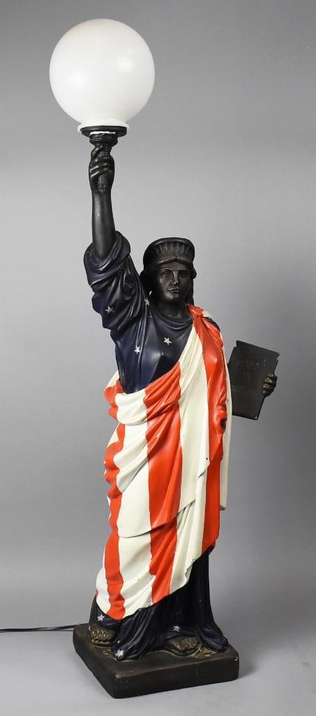 Vintage Statue of Liberty Table Lamp, Hard Plastic: This is a fun patriotic Statue of Liberty table lamp that appears to be hard plastic. She is deep blue with stars and draped with red and white. She is working. No visible marks, stands approx. 53"