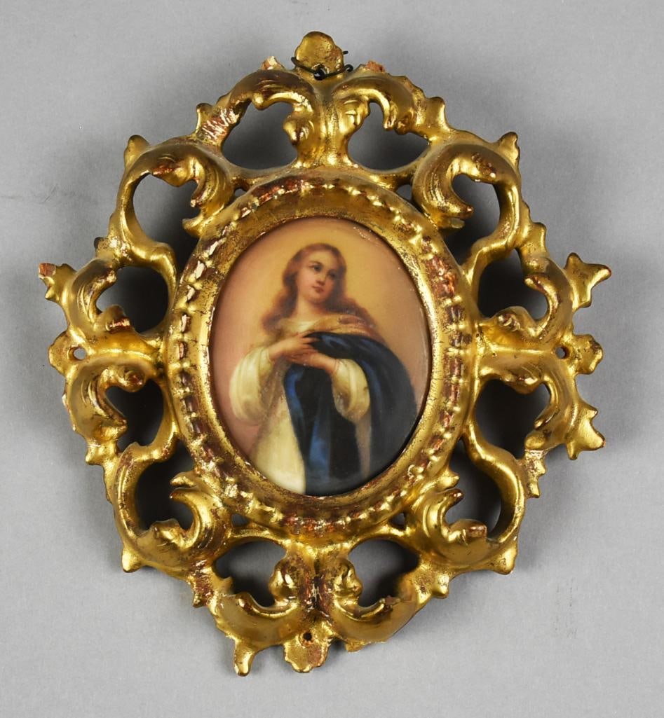 After Bartolome Murillo Virgin Mary, Hand Painted Porcelain: Wonderful antique portrait painting of the Virgin Mary. She was originally painted by Bartolome?Esteban Murillo, c1678. She is with head tilted and holding a blue robe. Frame is solid wood carved open