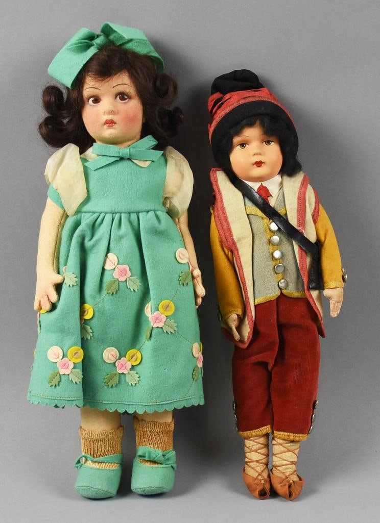 c1930 Lenci Lucia Face and Lenci Type Boy Doll: Adorable pair of vintage dolls from the 1930s. First is a Lenci with Lucia face, felt with side glancing eyes with tinted cheeks and knees.? Felt dress with matching hair bow and shoes. Boy is a Lenci