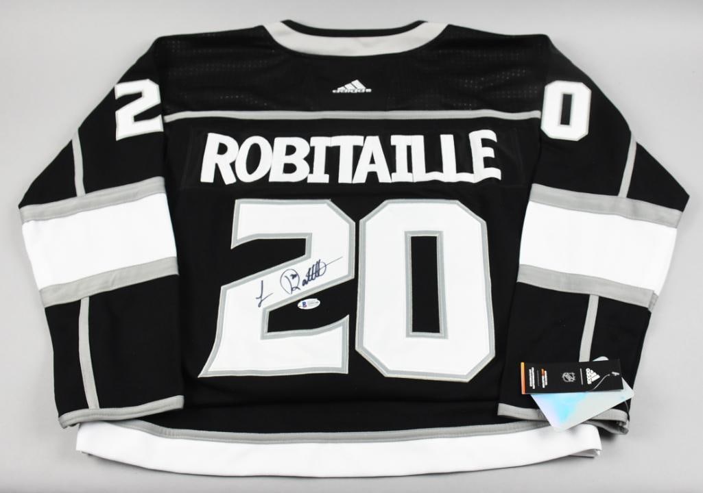 Los Angeles Kings Luc Robitaille Signed Jersey, Beckett: Nice looking replica Los Angeles Kings jersey signed by Luc Robitaille, previous Left Wing player, currently serving as Los Angeles Kings president.? This jersey has been certified by Beckett with