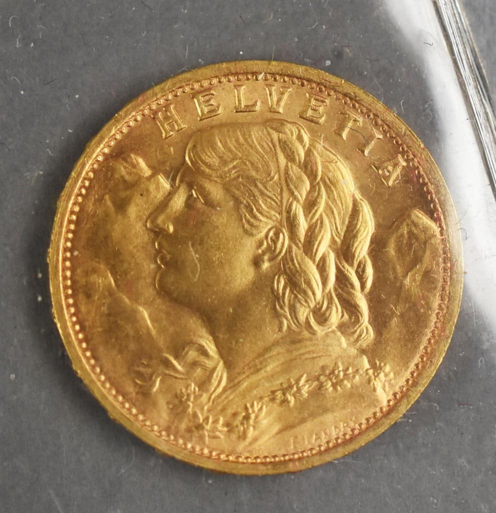 1927 Helvetia 20 Swiss Fancs Gold Coin: Lot is a 1927 Swiss Helvetia 20 francs gold coin.