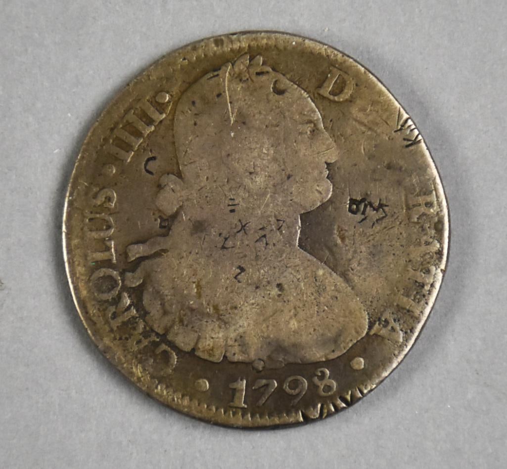 1798 Spanish Colonial King Carlos 8 Reales: Very cool and heavily circulated 1798 Spanish Colonial coin with King Carlos.