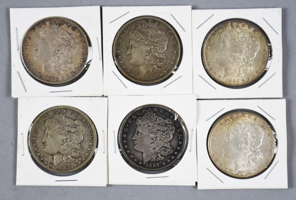 1883-1888 Morgan Silver Dollars - VF to EX: Lot is for six Morgan silver dollars, consecutive dates of 1883-1888 with the 1886 having an O mint and 1887 being an S mint.