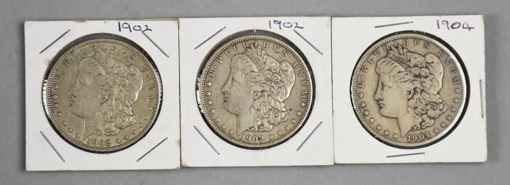 1902, 1904 Morgan Silver Dollars - VG to EX (1 of 3)