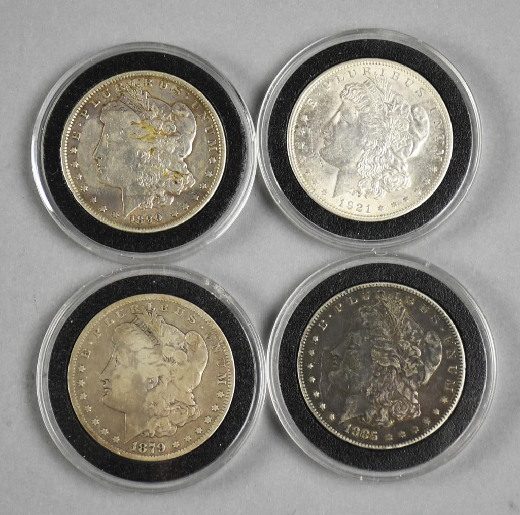 1879-1921 Morgan Silver Dollars - VG to EX: Lot is for four Morgan silver dollars. There is an 1879 S, 1885, 1890 and 1921.