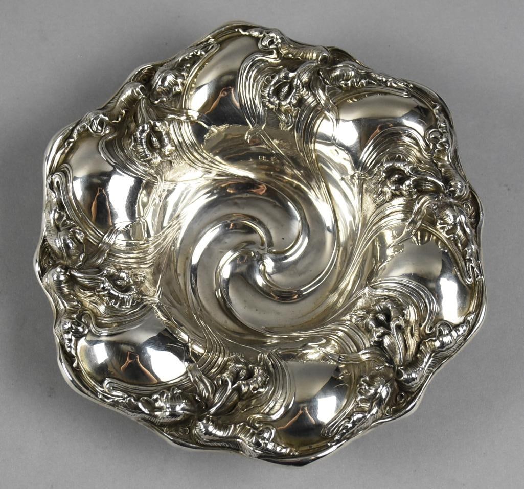 c1890 Unger Brothers Sterling Floral Bon Bon Bowl: This wonderful piece is from Unger Brothers (1872-1914). It is a a hollowware bowl with an Art Nouveau floral motif. Bowl measures approx. 8" across and approx. weight of 100 grams.