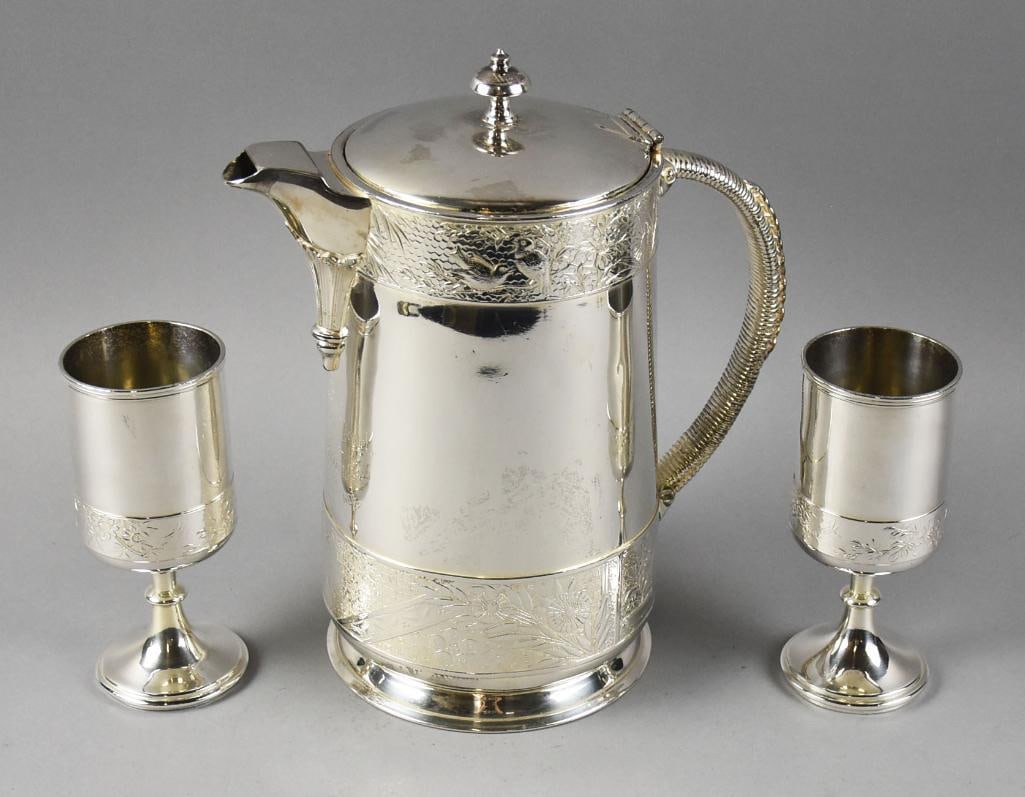 1868 Meriden Silver Plate and Porcelain Pitcher & Goblets: This stunning set is an 1868 Meriden Silver Plate Co. pitcher with matching goblets. Pitcher has porcelain insert, low relief birds in trees around the top band and flowers and ribbon detail around ba