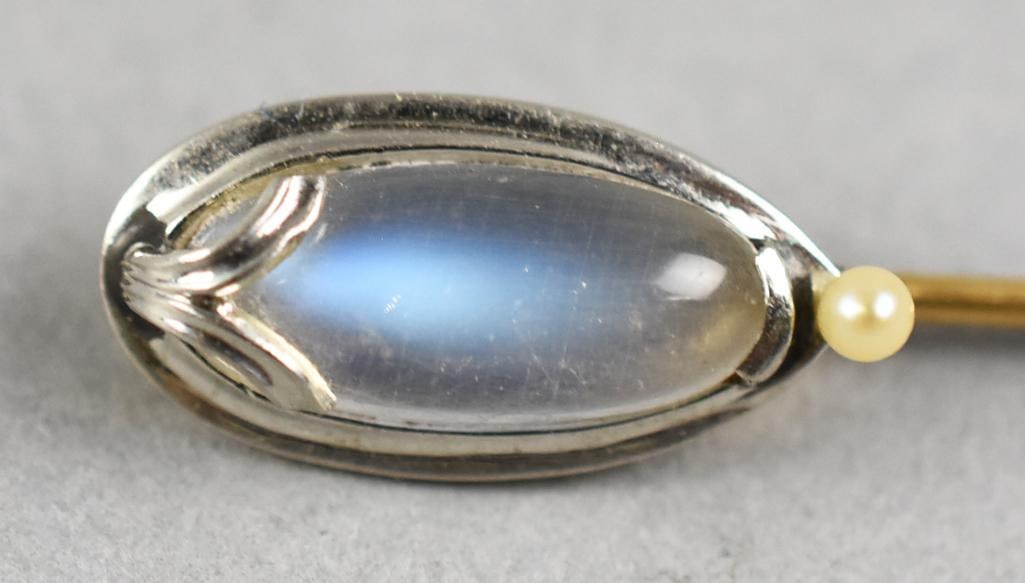 Vintage 14K Yellow Gold Moonstone Stick Pin: Beautiful stick pin in 14K yellow gold. Set with an oval cabochon moonstone and pearl accent. Stamped on pin, no additional marks. Approx. 2.5:" long.