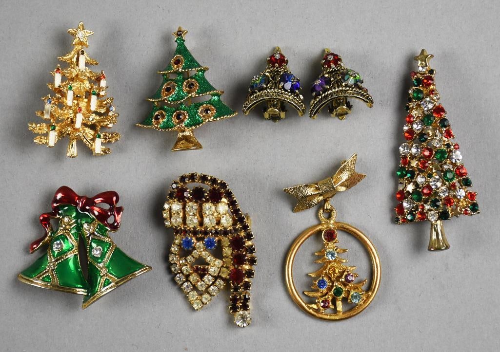Vintage Christmas Costume Jewelry Collection: Fun costume jewelry collection that is all for Christmas. Includes four different Christmas tree brooches, pair of Weiss Christmas tree earrings, rhinestone Santa and enamel bells attributed to SFJ.