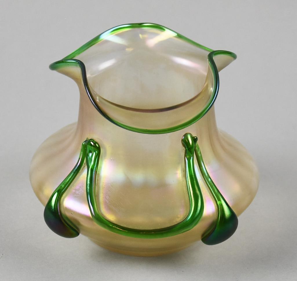 c1900 Wilhelm Kralik & Sohne Iridescent Ruffle Vase: This beautiful piece is a 1900s Wilhelm Kralik & Sohne?Bohemian art glass. Iridescent glass with applied green teardrop with swag details on front and green trimmed ruffle rim. It is marked Steuben