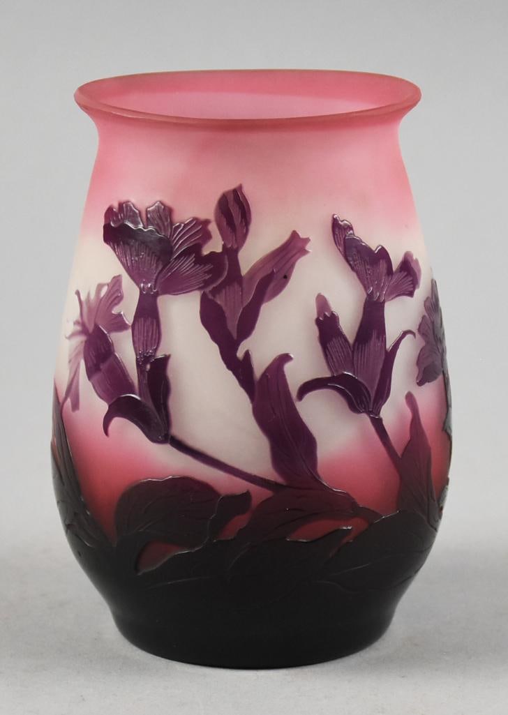 Antique Galle Cameo Glass Cabinet Vase: Beautiful antique cabinet vase in Galle style. It is very similar to the Galle Clematis or tulip line. Cameo glass, pink to clear to purple with flowers and leaves. It is signed Galle and stands