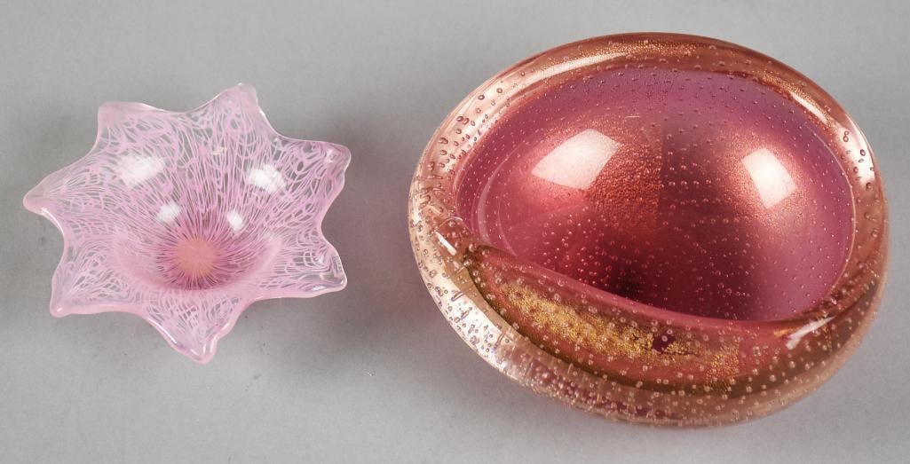 Vintage Murano Pink Art Glass Bowls: Lovely pair of vintage Murano glass bowls. The smaller pink abstract six point star with web design throughout. Retains the original paper label and measures approx. 1" x 4". Bowl in darker pink with 