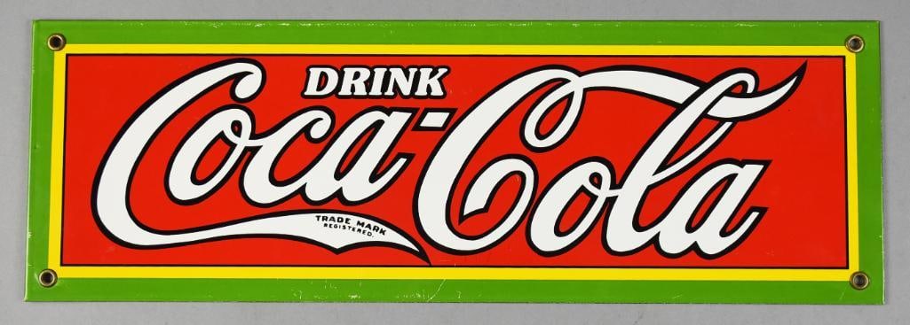 Vintage Drink Coca Cola Single Sided Porcelain Sign: Very cool possible reproduction of a Drink Coca Cola porcelain sign. Single sided, white with orange, green and yellow with black outlined letters. Measures approx. 6" x 18". From the home of a