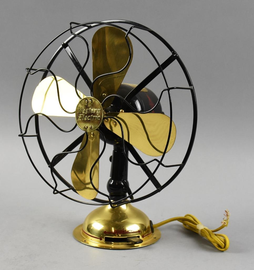 c1920 Western Electric Alternating Current Fan, Restored: Wonderful restored Western Electric alternating current fan is from the early 1920s. Motor is a high shine black enamel with red accents, base and fan blades appear brass and are highly polished with