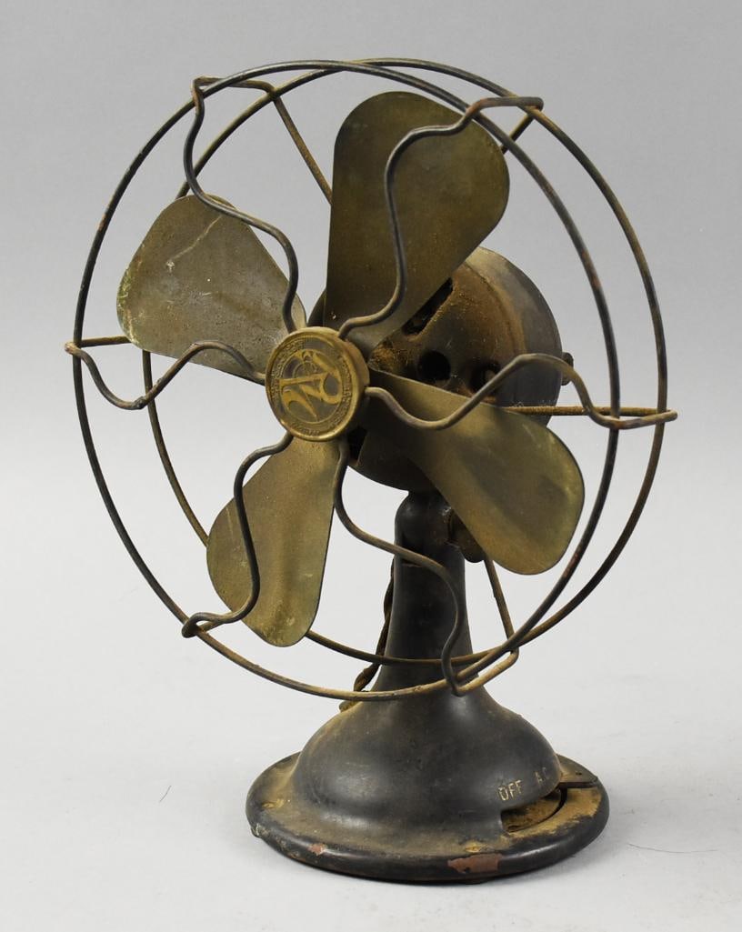 c1915 Robbins & Myers No. 3500 Wall Mount/Desk Fan: Wonderful antique fan from Robbins & Myers Co. It is list model 3500. Cast iron base with four blades that appear brass and steel cage. The bottom of the base has a keyhole opening which can be used