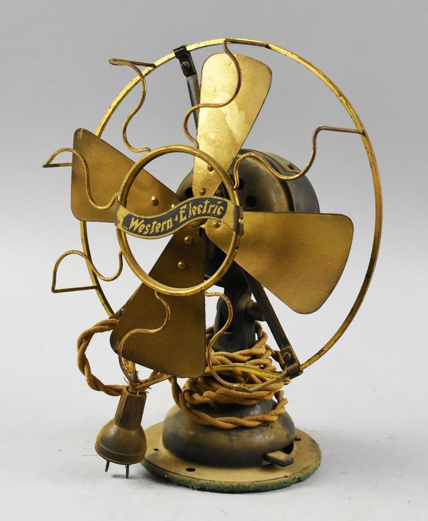 c1920 Western Electric Alternating Current Fan: Awesome 1920s fan from Western Electric. It has an alternating current motor, W1 78695, serial appears to read 699609. Cast iron base with four brass blades and what appears to be a brass cage. Cord a