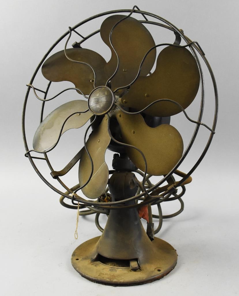 c1915 Emerson Six Brass Blade Residence Desk Fan: Great old fan from The Emerson Electric Mfg Co. It is a No. N02934, Residence desk fan. Fan appears all original with cast iron base, six brass blades and what appears to be a steel cage. Cord