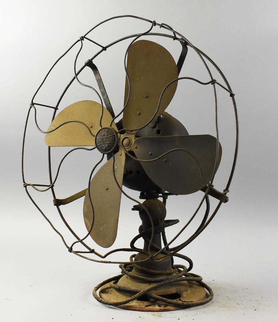 c1910 Emerson Lever Oscillating Four Blade Desk: Great antique fan from The Emerson Electic Mfg Co. It is a no. 255568 with the Type being heavily worn away. Cast iron base with lever, four blade brass fan with what appears to be a steal cage. Cord