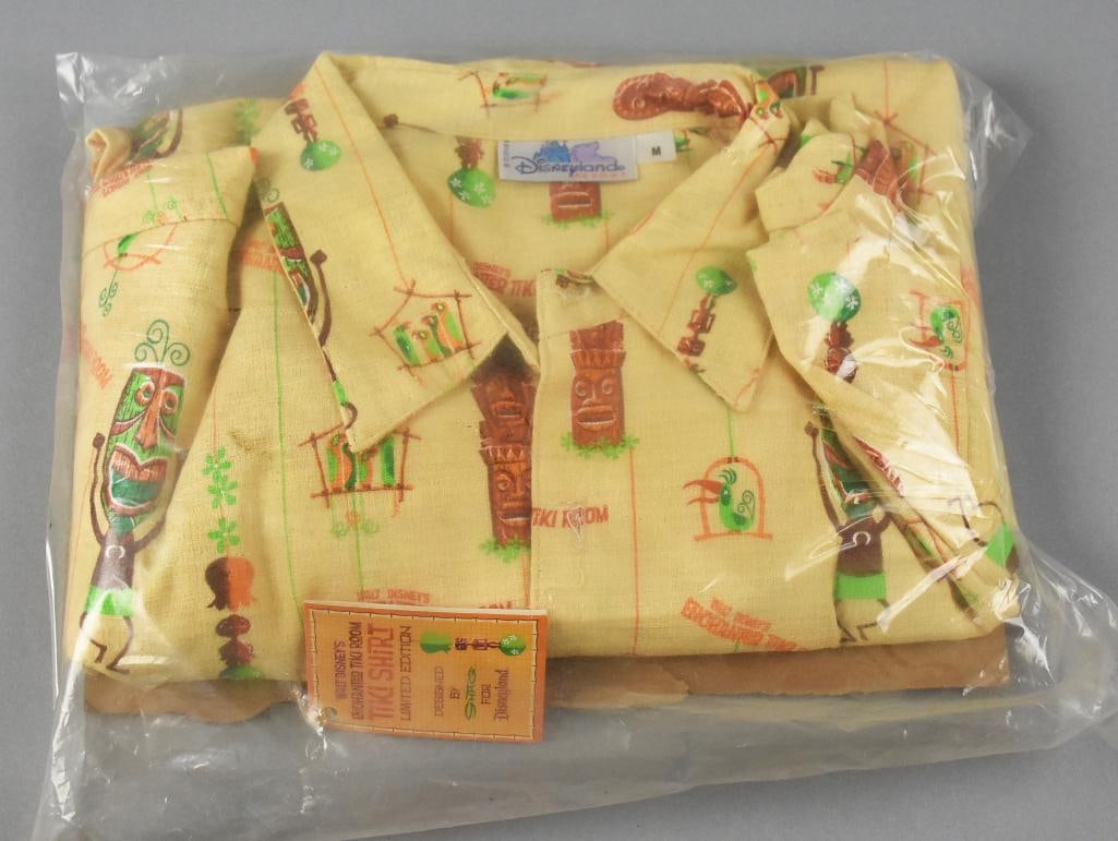 Disney Shag Enchanted Tiki Room Shirt LE 99/500 Signed NWT: Custom shirt designed by famed designer Shag Josh Agle. It is a limited edition Hawaiian style shirt for the Enchanted Tiki Room. Fun shirt with tiki masked dancers and totem designs. It is signed by 