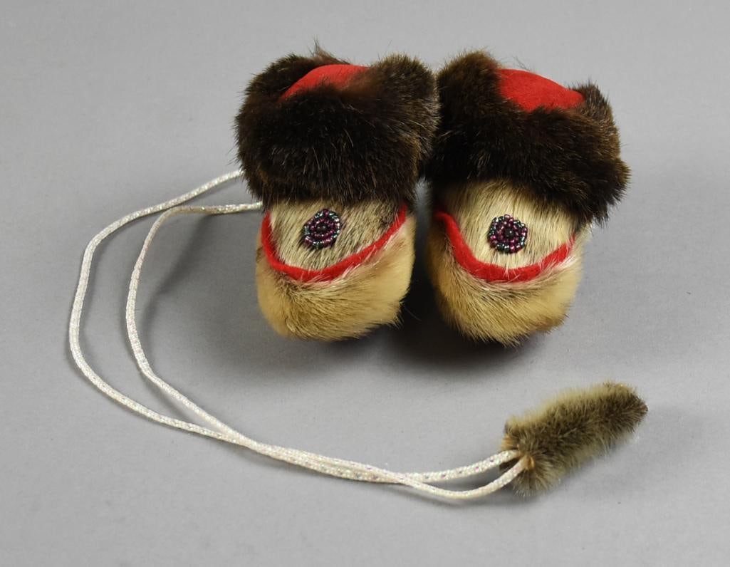 Vintage Inuit Childrens Slippers or Boots, Fur & Beads: Adorable pair of Inuit children's slippers or mukluk style boots. They appear to be real fur with suede sole and hand beaded details on tops. They are approx. 3" x 4".