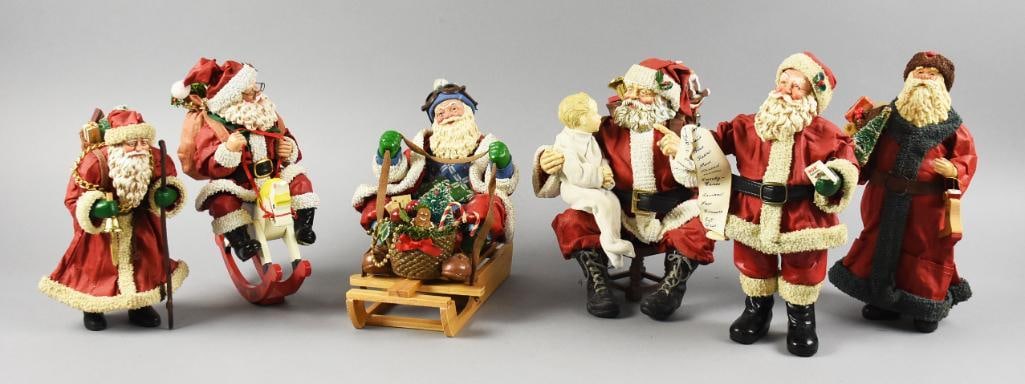 1980s-1990s Possible Dreams Clothtique Santa Claus Figures: A charming collection of seven Possible Dreams Clothtique Santa Claus figures from the 1980s and 1990s. These handcrafted figures, marked with the iconic Possible Dreams Ltd. labels, display details s