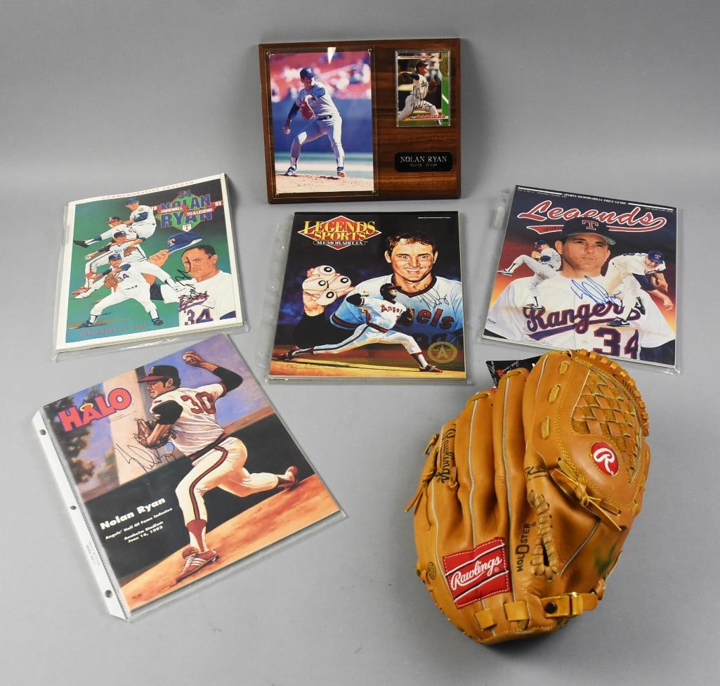 Nolan Ryan Hall of Fame Pitcher Signed Glove & More: Comprehensive Nolan Ryan memorabilia collection including a signed trading card displayed on a wooden plaque, four collectible publications with images and artwork of Nolan Ryan, and a Rawlings RBG34