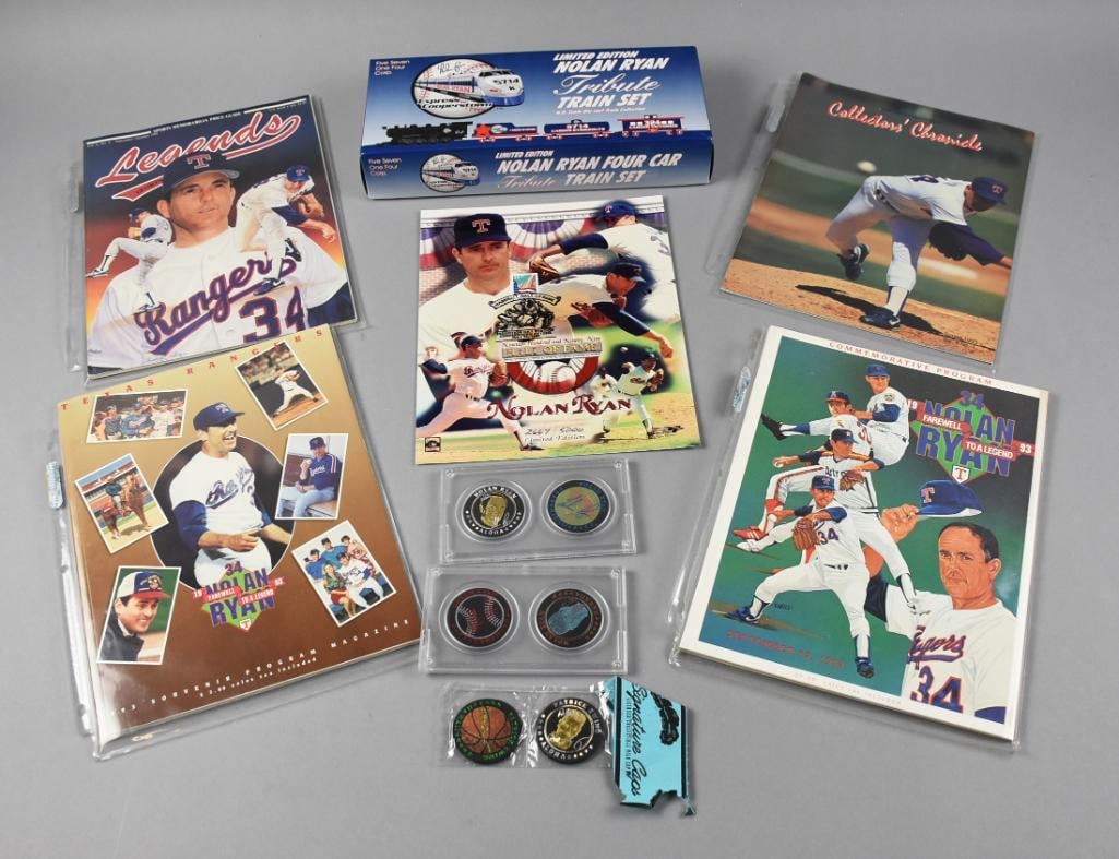 Nolan Ryan Hall of Fame Pitcher Memorabilia: A limited-edition Nolan Ryan Tribute Train Set (No. 1695 of 5714) signed insert included. Contains collectible coins and Signature Caps, presented in protective holders. Features limited edition Nolan