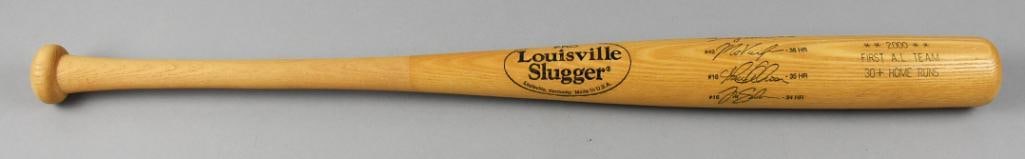 Anaheim Angels 2000 First AL Team Home Run Bat: This Louisville Slugger commemorative bat features the engraved signatures of Troy Glaus, Mo Vaughn, Garret Anderson, and Tim Salmon alongside their respective home run totals (47, 36, 35, and 34) dur