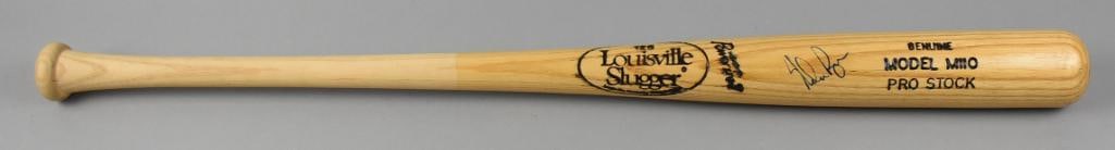 Nolan Ryan Hall of Fame Pitcher Signed Baseball Bat: This Louisville Slugger Genuine Model M110 Pro Stock baseball bat is signed by Hall of Fame pitcher Nolan Ryan. Known for his legendary career, Ryan's autograph adds significant historical appeal to