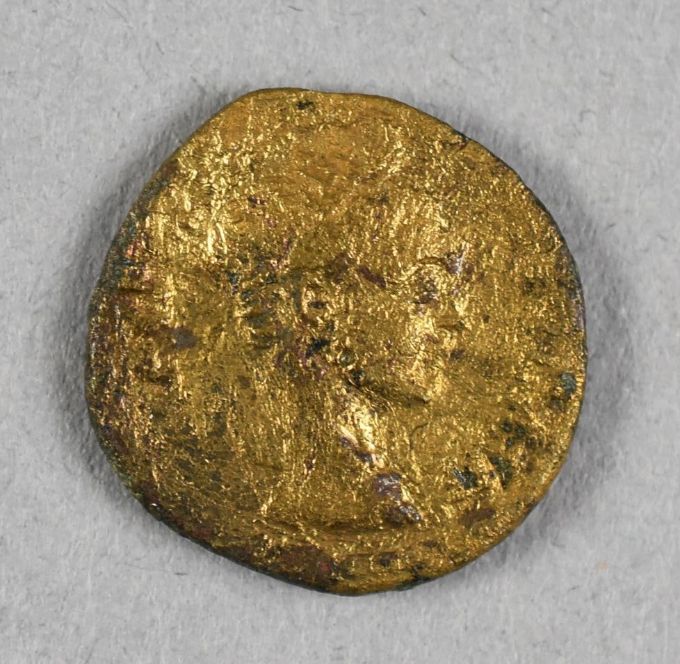 Ancient Roman Bronze Coin: Lot is for an ancient coin that appears to be Roman. Obverse is a right facing bust, almost appears to be female. Reverse appears to be two figures standing side by side. Appears bronze.