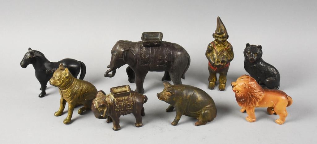 Antique Cast Iron Clown & Assorted Animals Still Banks: Great assortment for you bank collectors. This lot includes a cool clown from AC Williams, black cat attributed to Hubley, sitting pig from AC Williams, Boxer dog from Hubley, "Beauty" horse attribute