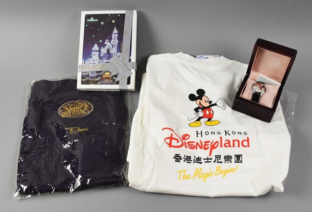 Special Edition Disneyland Hong Kong Gift Set, Complete MIP: These pieces were part of a gift set for Disneyland Hong Kong. Complete set includes the Magic Castle notebook, white t-shirt, garment bag and limited edition Grand Opening watch.