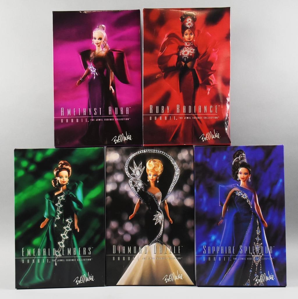 (5) 1996 Mattel Bob Mackie Barbie Dolls NRFB NOS: This lot is for five Mattel Barbies Jewel Essence, all wearing Bob Mackie. Includes Amethyst Aura, Emerald Embers, Ruby Radiance, Sapphire Splendor and Diamond Dazzle.