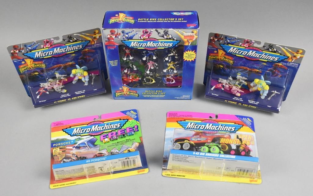 (5) 1990s Galoob Micro Machines Power Rangers PLUS-MIP-NOS: Lot is five 1990s Galoob Micro Machines Power Rangers PLUS-MIP-NOS. Includes Battle Bike Collector Set and two Titanus vs Sphinx. Included #8 Porsche and #43 Big Bruisers. Single owner collection