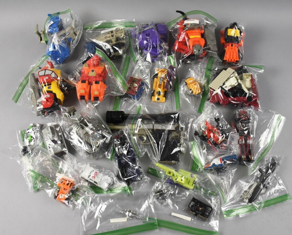 Large Assortment Diecast Vehicles, Unchecked: These toys have all been individually bagged by the client. They include Reflector, Grimlock, Tantrum, Rampage, Hans-Cuff, Megatron, Shockwave and many others.