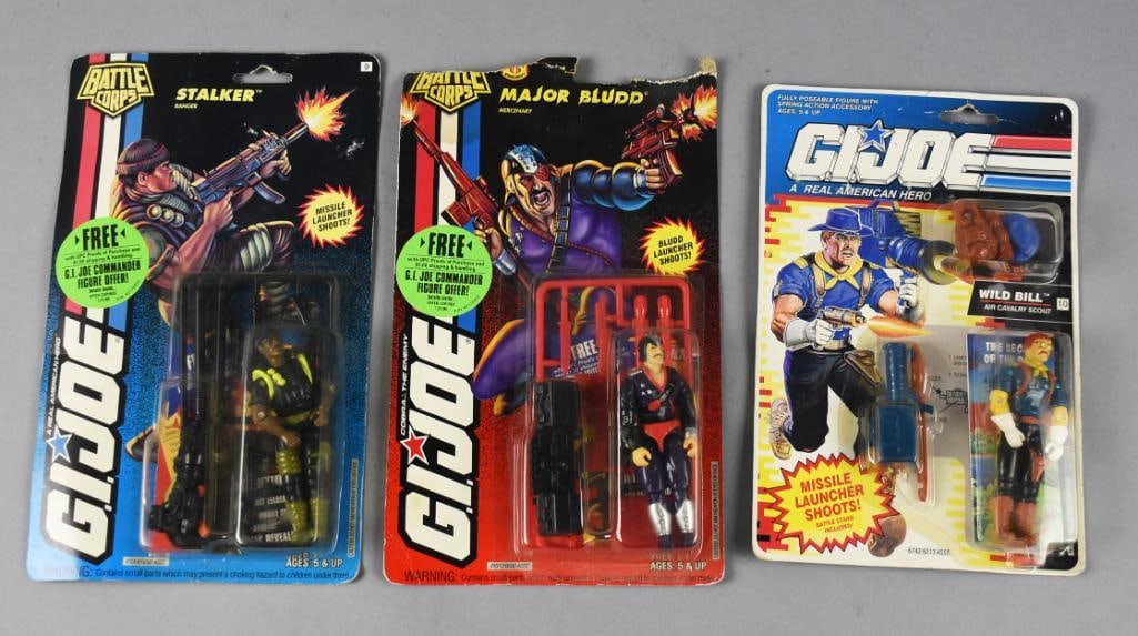 (3) 1990s Hasbro GI Joe Action Figures - MOC NOS: Lot is for three 1990s GI Joe action figures from Hasbro. They include Wild Bill and two Battle Corps: Stalker and Major Bludd.