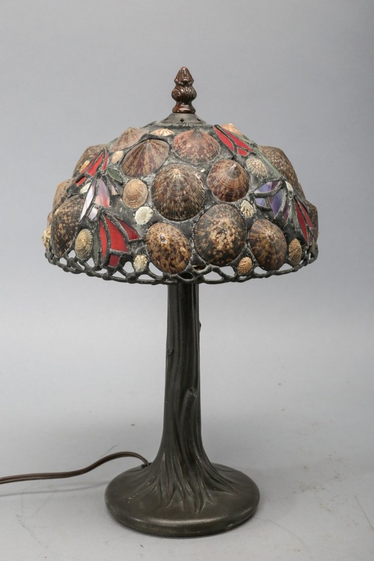 Smaller Hoosin Ltd Studio Shell Lamp, Sea shell Tiffany: Nice smaller Hoosin Ltd Studio chell lamp in Tiffany style. Shade is made of shells and slag glass in a floral motif. Stands 14", shade is 8" wide.