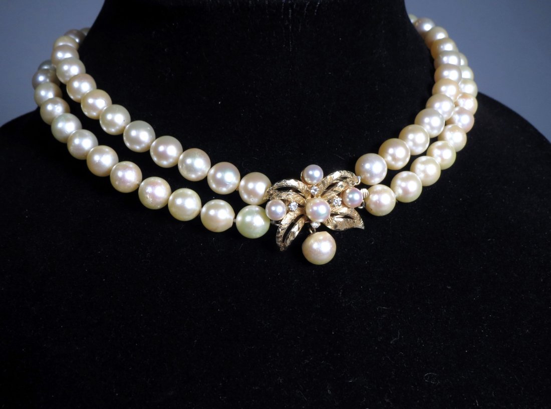 Beautiful 14k & Diamond Double Strand Pearl Choker: Nice double strand of good lustre saltwater cultured. 11mm pearls with a 14k yellow gold & diamond flower or bow clasp. Very Classy! Necklace measures 7.5 inches, choker length.