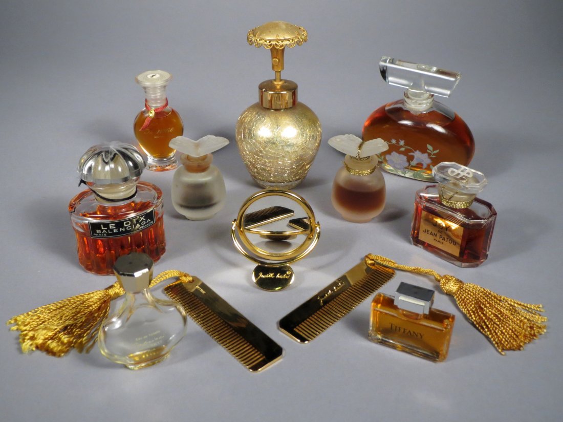 Lot Vintage Perfume Bottles, Baccarat, & Judith Leiber: Nice lot of 9 perfume bottle and a Judith Leiber 3 pc vanity set. One full bottle of "Flora Danica", One 3/4 full Baccarat bottle of "Le Dix Balenciaga", One full bottle of "Joy de Jean Patou", One fu