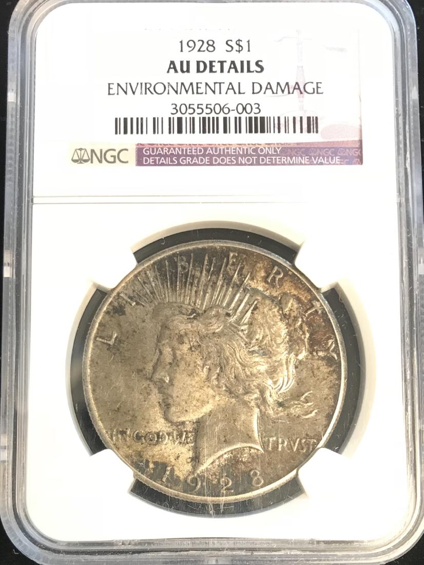 1928-P Peace Silver Dollar NGC AU Details (1 of 3)