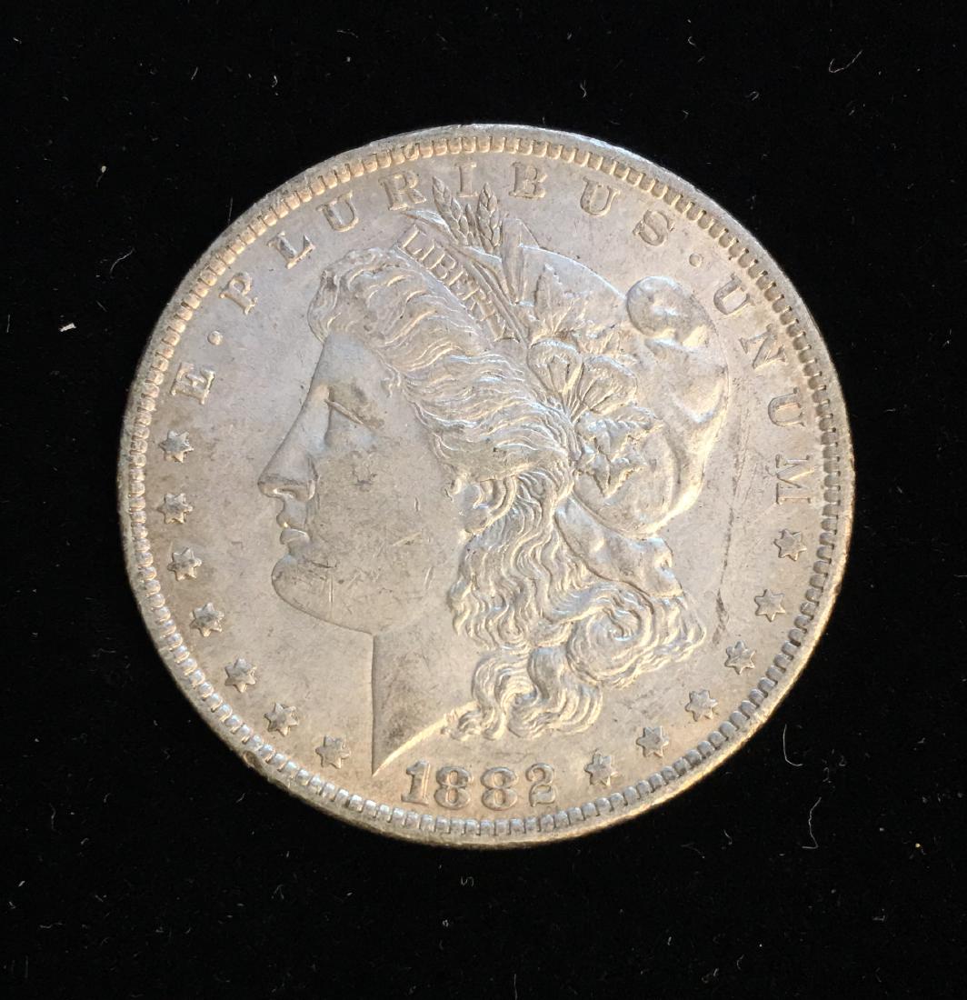 1882-O/S Strong $1 Morgan Silver Dollar AU (1 of 2)