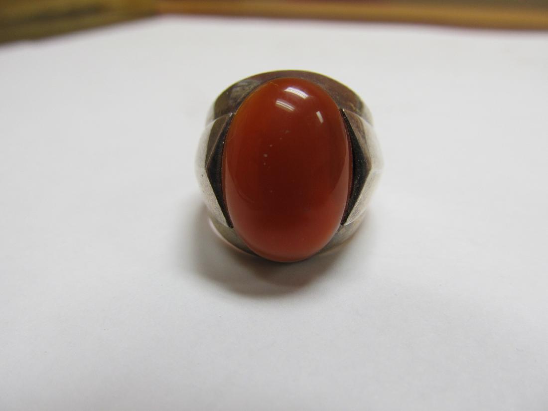 TURKEY STERLING SILVER FINE RING CARNELIAN 10 CARATS: This attractive sterling ring is also stamped Turkey on the interior. It is in overall excellent condition with some slight scratching from being enjoyed. The colorful carnelian measures approximately