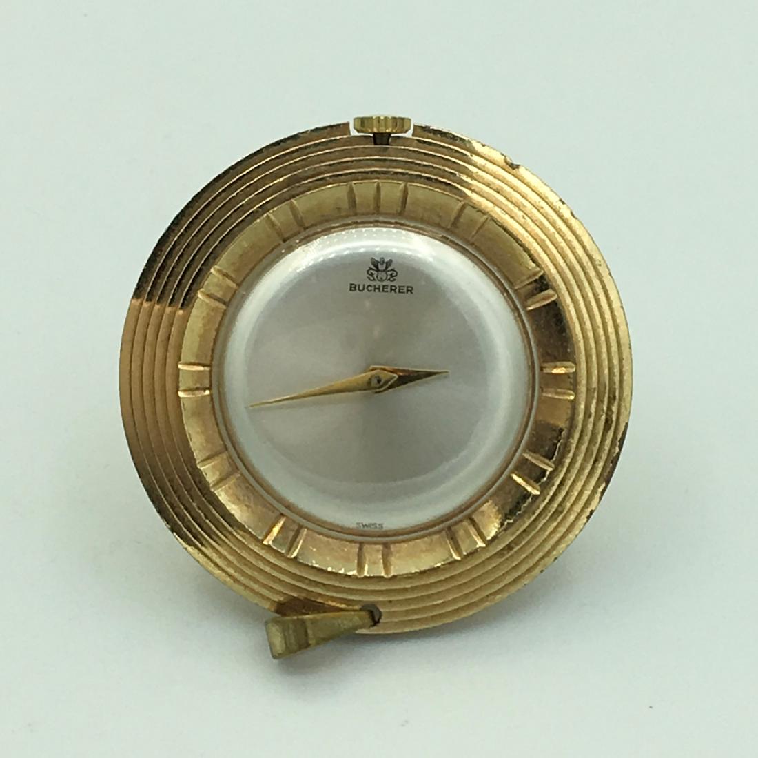 Rare Bucherer Swiss Pontifa 17J 10K Gold Plate Open: Rare Bucherer Swiss Pontifa 17J 10K Gold Plate Open Face Ladies Pendant Watch. 35 mm Diameter Case in Very Nice Condition. Running Working Condition May Need Overhaul.