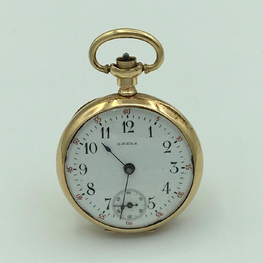 Vintage Omega 14K Yellow Gold Open Face Ladies Pocket: Vintage Omega 14K Yellow Gold Open Face Ladies Pocket Watch Pendant Size 0s. Serial Number 1380049. 24.5 grams 15.8 dwt. Slight Crease in Case Back See Photo. Missing Crown, Not Running.