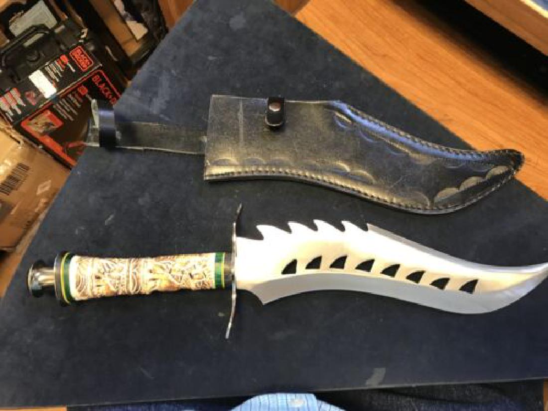 CHIPAWAY CUTLERY Pakistan Display Knife 20" Length: CHIPAWAY CUTLERY Pakistan Display Knife 20" Length with Very Ornate Handle. Pre-Owned. Comes with black sheath. Please see all photos for items condition and as a part of the description. Sold as is.