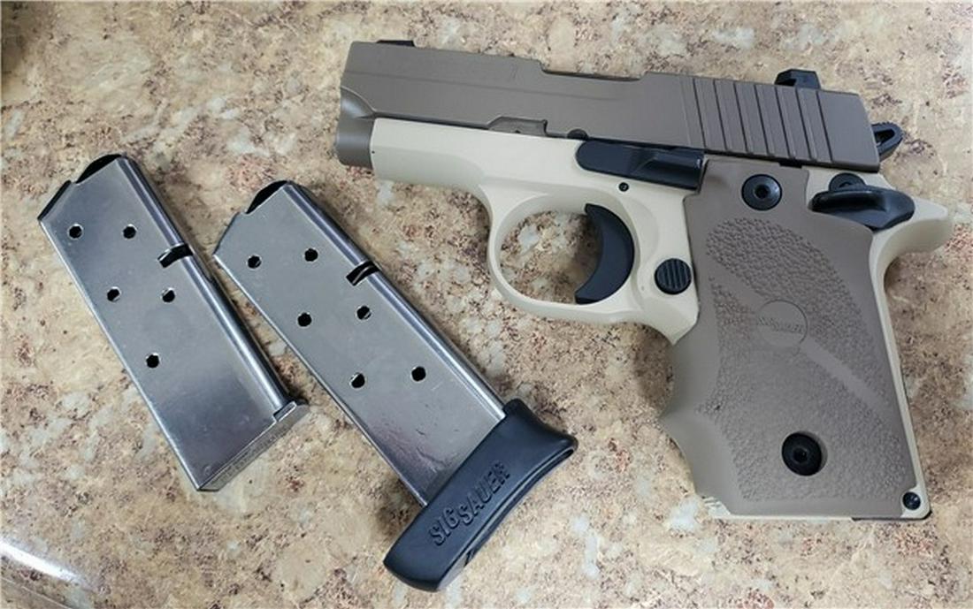 Sig P238 FDE with Night Sights and Holster: Up for sale is a good used condition P238 chambered in .380 ACP. Not much wear at all on he gun and finish is near perfect. A small ding here and there. Comes with bright night sights. 2 mags ( one ex